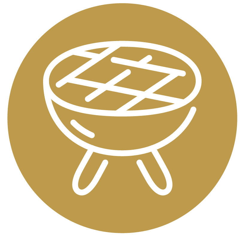A simple, white line drawing of a circular grill with a patterned top, set against a gold background, representing outdoor cooking or barbecuing.